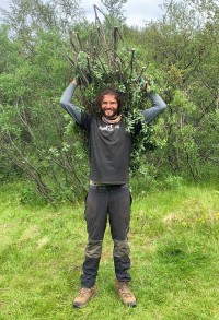 Gathering willow branches for a land restoration project (Naomie Winch)